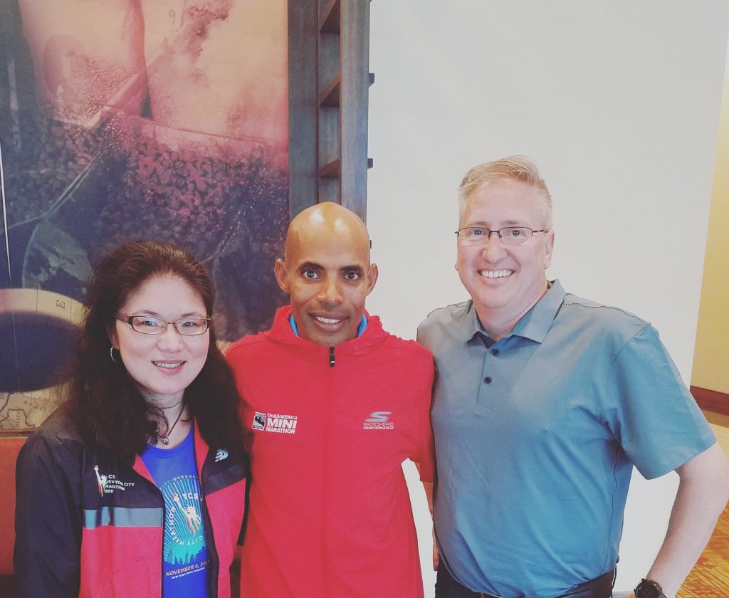 Kristin Meekhof with Champion Meb Keflezighi and 7 Continent Marathoner Michael Silvio, May 2018